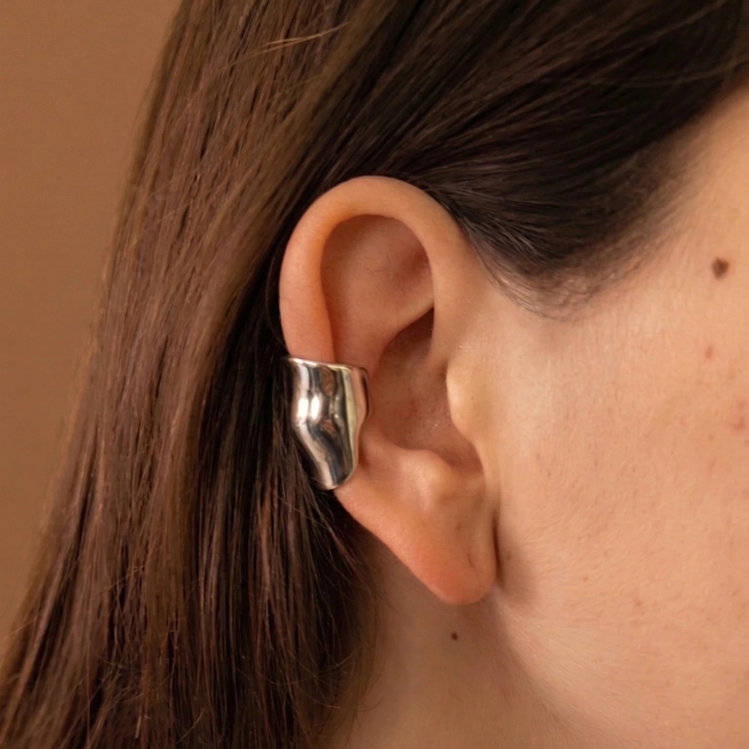 zoom cuff earing sliver on model 